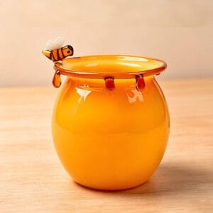 Amber handblown glass honey pot with handmade glass bee ornament and dripping honey decorations, creative glass storage jar