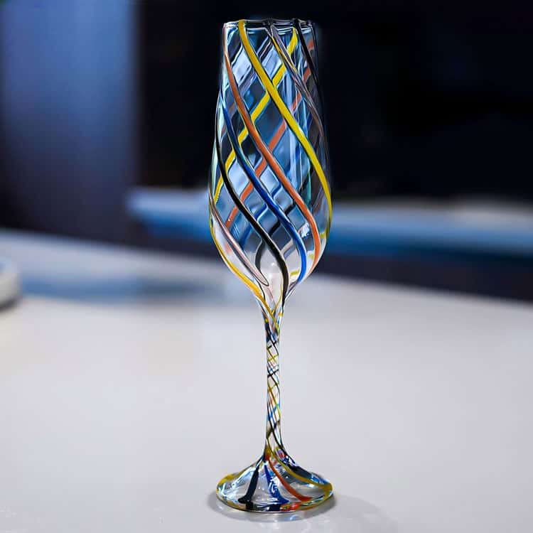 Handblown tall champagne flute with multi-color twisted swirl stripes, handmade colorful striped stem glass for bar serving