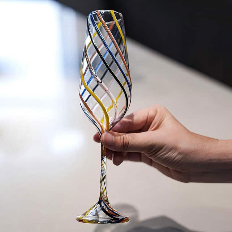 Handheld handblown champagne flute with multi-color twisted swirl stripes, handmade artistic stemmed glass for wine and cocktail
